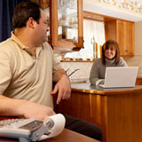 man and woman at computers